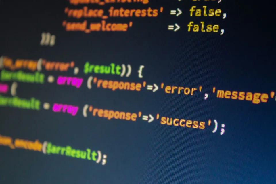 A developer debugging error logs while stabilizing a legacy PHP CodeIgniter application