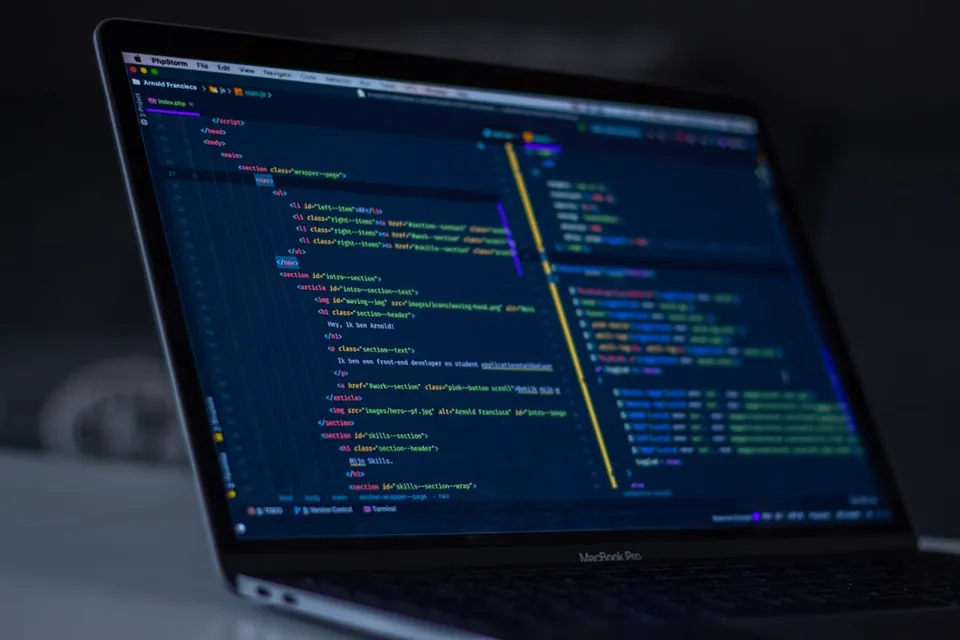 A developer writing code in an editor outside the sandbox environment